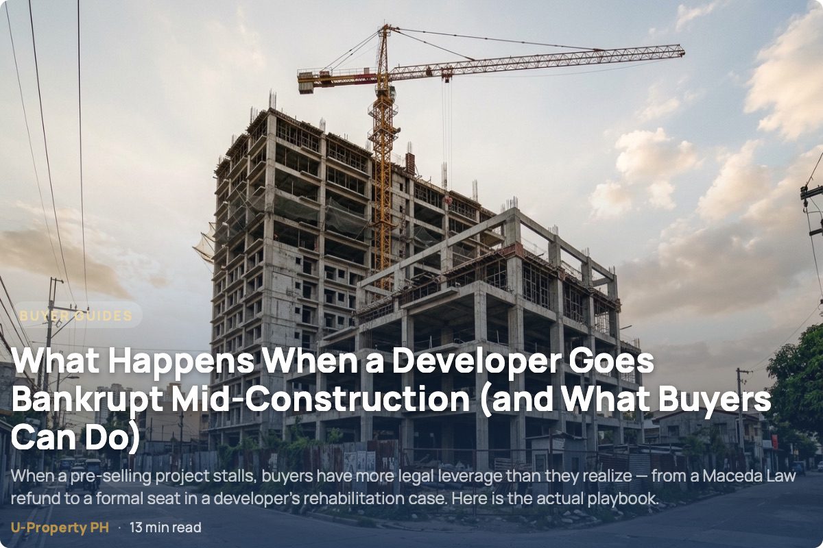 Halted high-rise condominium construction site in Metro Manila with idle cranes and no visible worker activity